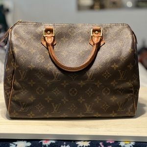 Authentic speedy 25. Good condition.